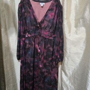 This is a Sofia Vergara Empire Maxi Dress with a plum floral pattern.